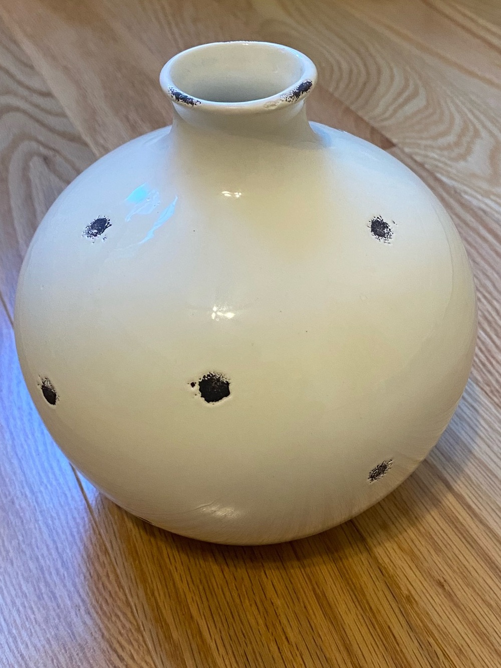 Small cream and black dotted vase